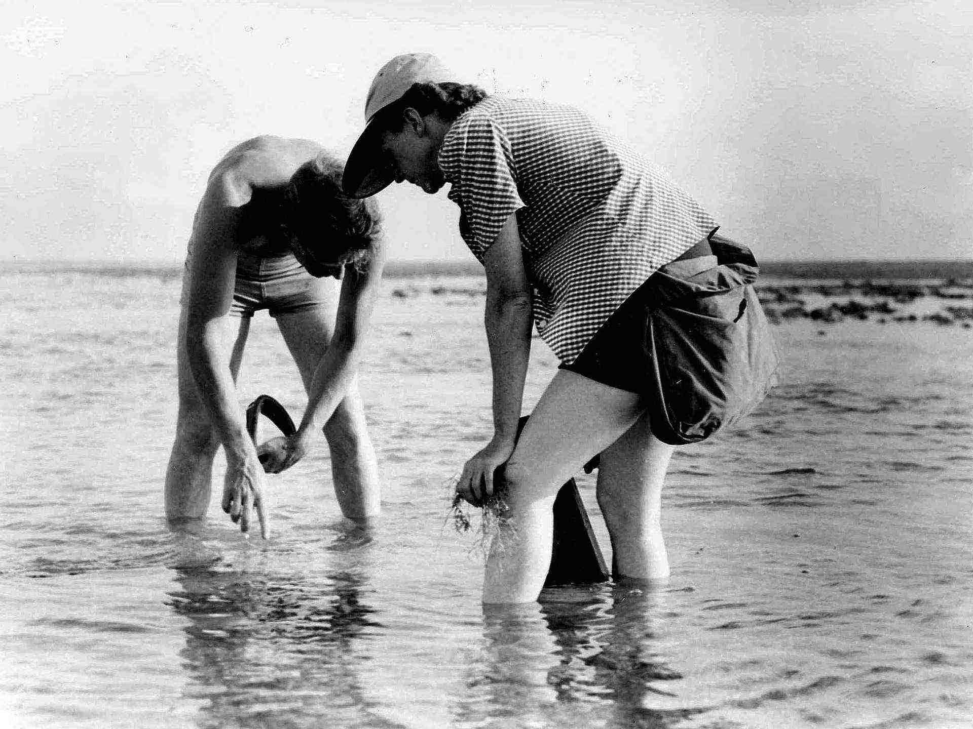 Old-photo-of-man-and-women-in-water Old-photo-of-man-and-women-in-water
